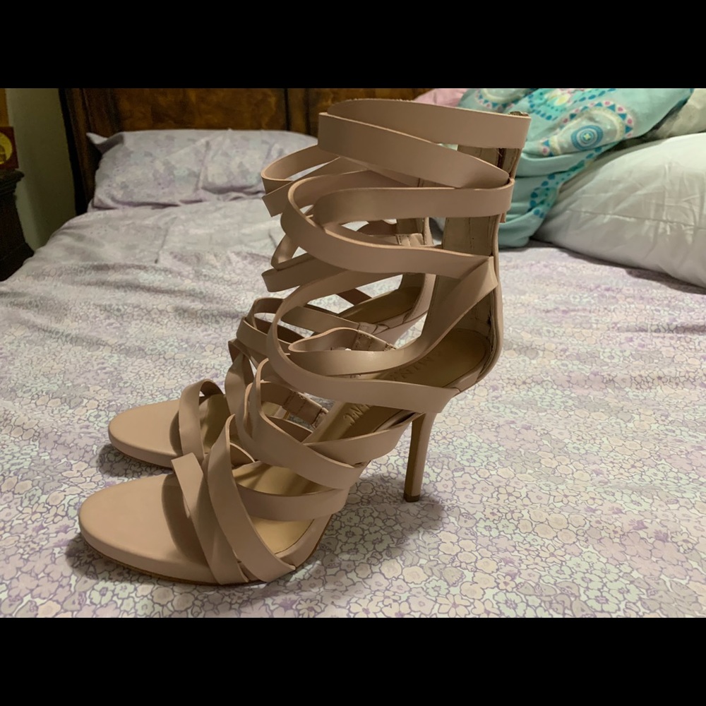 Women beautiful high heels sandals . Never worn. New without tag. Nude color